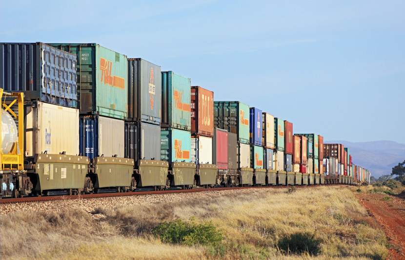 Inland Rail train carrying multiple shipping containers, Australia