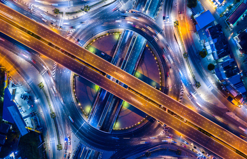 Aerial view of highway interchange at night