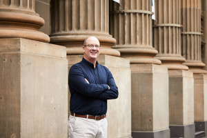 Greg Harrison, RPS  Victorian Lead for Strategy and Investment stands in front of Pillars outside the State Library of Victoria in Melbourne CBS.