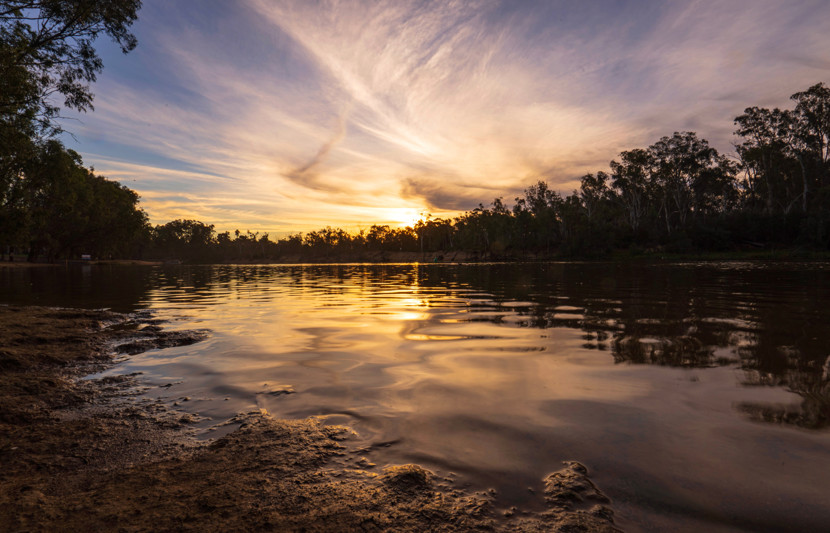 Body of water at sunset