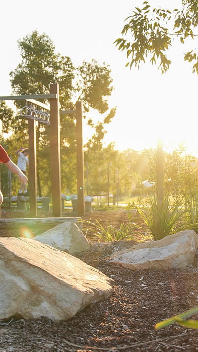 Boy plays in Yarrabilba - Borrol Lookout Park